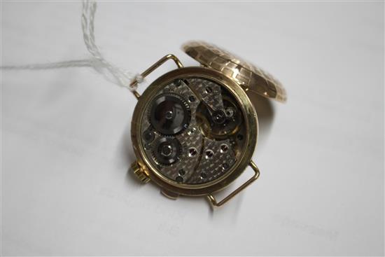 A ladys 1930s yellow metal (stamped 9c) Golfball? manual wind wristwatch, with hinged cover, no strap,
